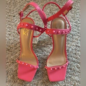 Pink sandals with acrylic heels. Never worn